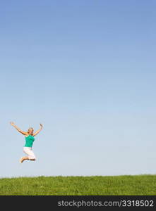 Senior woman jumping in air