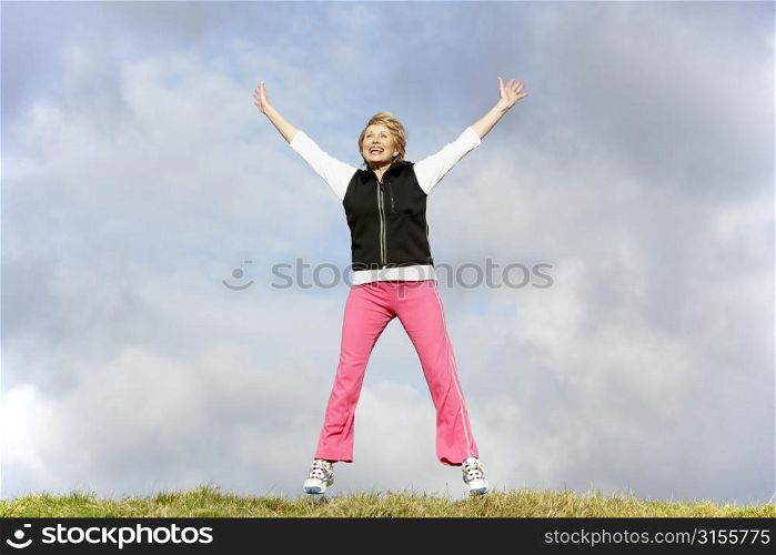 Senior Woman Jumping In The Air