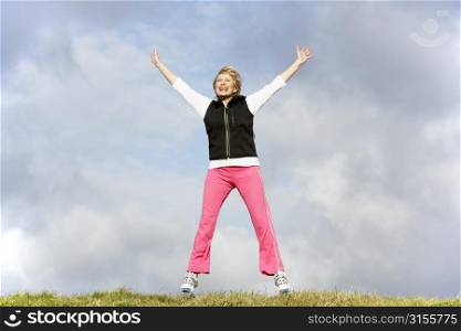 Senior Woman Jumping In The Air