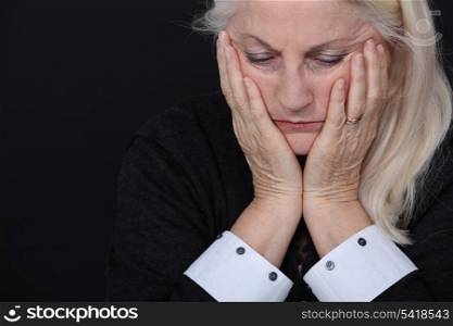 senior woman looking sad and lonely