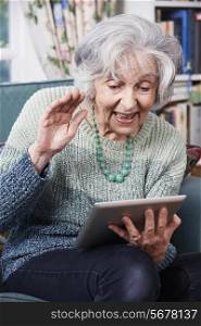 Senior Woman Making Video Call Using Digital Tablet