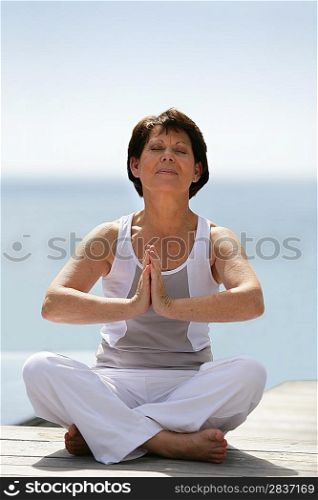 senior woman meditating