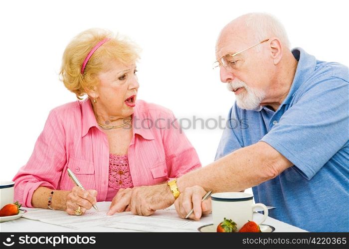 Senior woman offended by her husband telling her how to vote. Isolated on white.