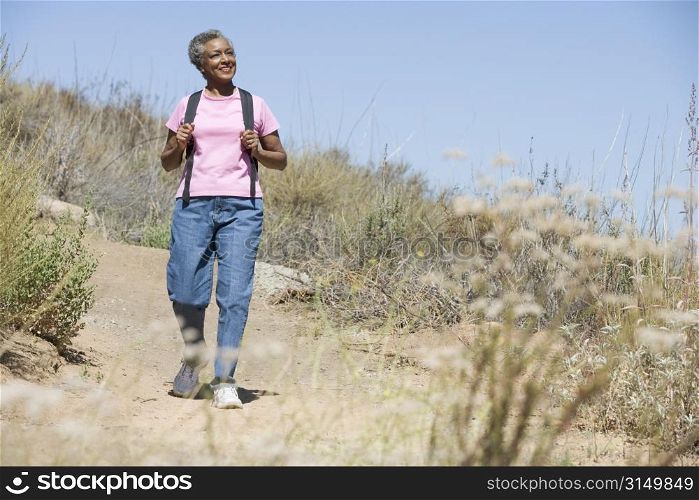 Senior woman on a walking trail