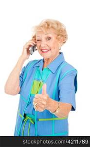 Senior woman on her cellphone gives a wink and a thumbs up sign for good reception.