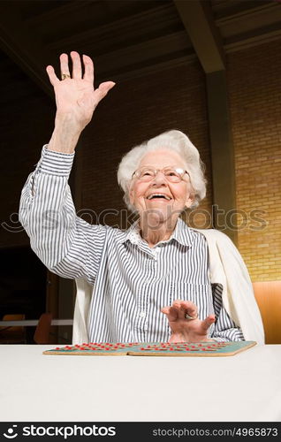 Senior woman playing bingo