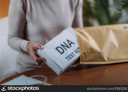 Senior Woman Preparing DNA Genetic Test Kit