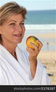 senior woman relaxing in a hotel near the beach
