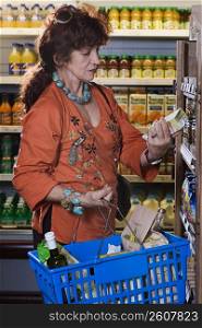 Senior woman shopping at grocery store