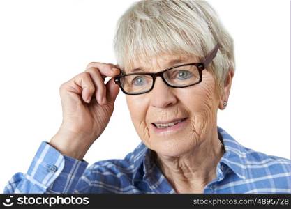 Senior Woman Trying On New Glasses