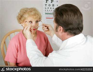 Senior woman trying out a new prescription from her optometrist.