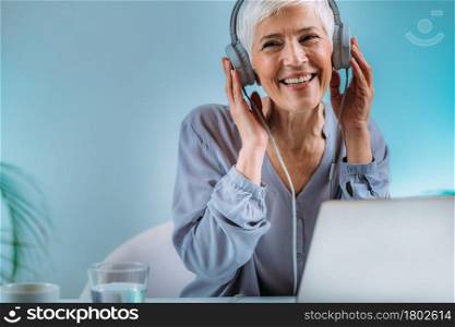 Senior Woman Using Laptop, Having Video Call.. Senior Woman on Video Call.
