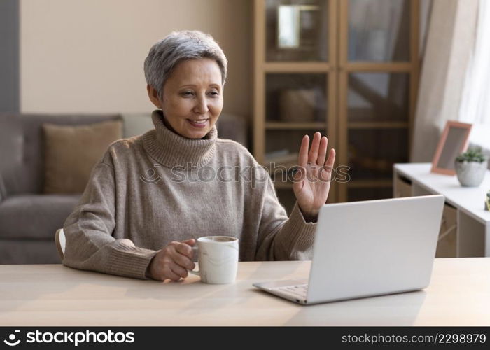 senior woman video conferencing