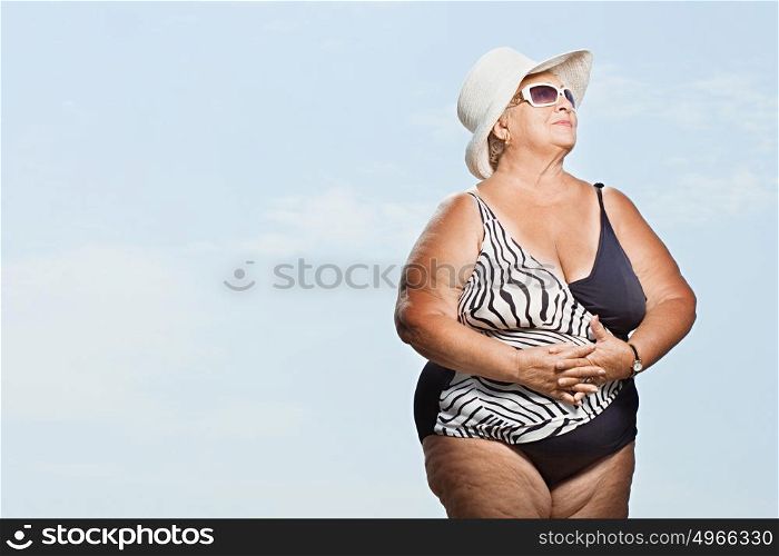 Senior woman wearing a swimming costume