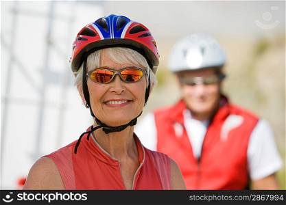 Senior woman wearing cycling helmet