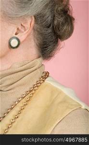 Senior woman wearing jewelry