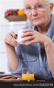 Senior woman with a cup of tea