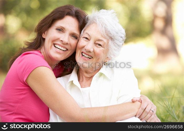 Senior Woman With Adult Daughter In Park