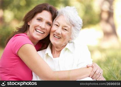 Senior Woman With Adult Daughter In Park