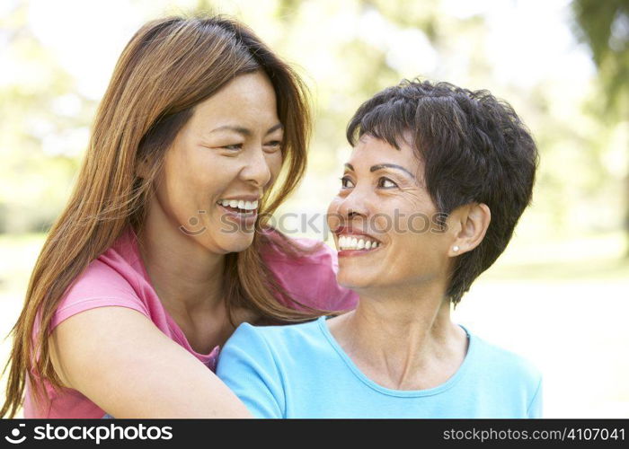 Senior Woman With Adult Daughter In Park