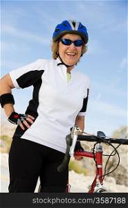 Senior woman with bike