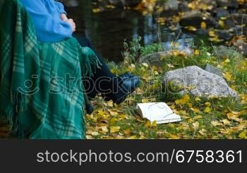 Senior Woman with Book in Autumn Park, Unrecognisable Person, Side View