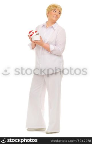 Senior woman with gift box isolated