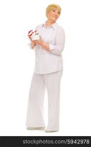 Senior woman with gift box isolated
