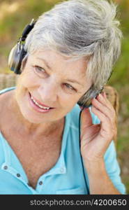 Senior woman with headphone