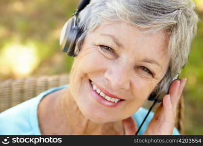 Senior woman with headphone