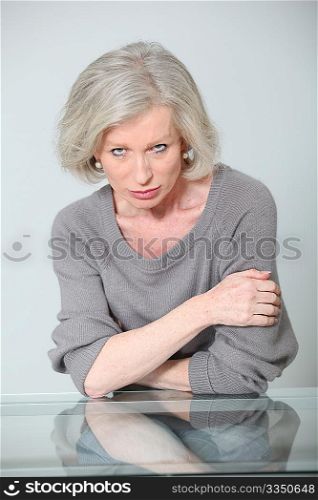 Senior woman with mad look