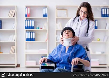 Senior woman with neck injury at doctors