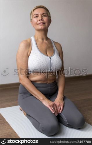 senior woman with short hair doing fitness