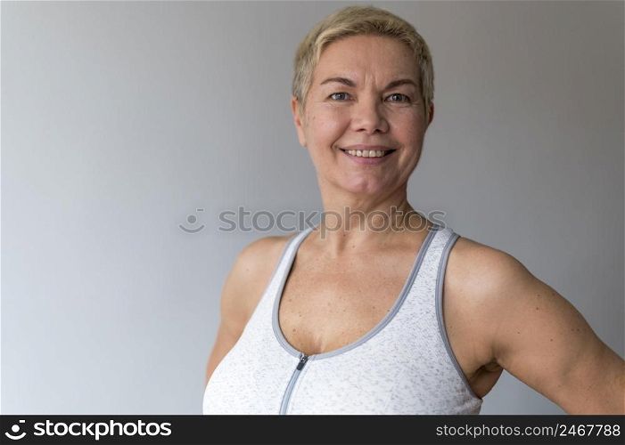 senior woman with short hair doing fitness 4