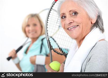 senior women playing tennis