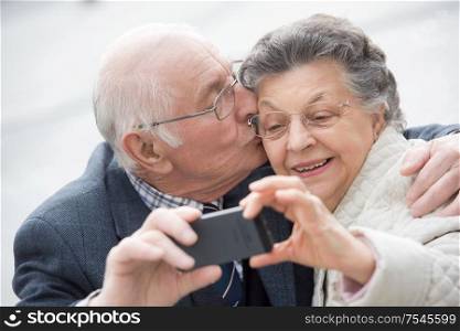 seniors having a sweet selfie
