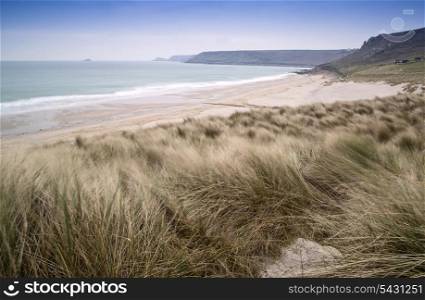 Sennen Cove beach and sand dunes before sunset Cornwall England