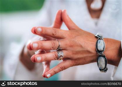 Sense of purpose meditation concept. Hands of a emotionally aware person during session, helping people find and develop their sense of purpose in life. Sense of purpose meditation concept