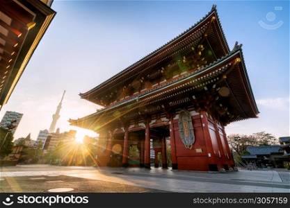 Sensoji-ji Temple in Asakusa with Tokyo Skytree in background during morning sunrise in Tokyo, Japan. Also known as Asakusa Kannon Temple, a famous tourist attraction in Tokyo.