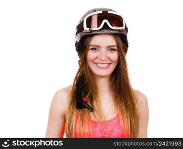 Sensual attractive femine, winter sport concept. Woman wearing alluring ski suit and helmet with goggles. Woman wearing ski suit and helmet with goggles