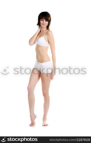 sensual girl in bra and shorts isolated in studio on white background