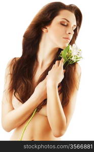 sensual healthy woman with white flower on white background