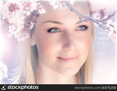 Sensual portrait of a spring woman, beautiful face female enjoying cherry blossom, dreamy girl with pink fresh flowers outdoor, seasonal nature, tree branch and glamorous lady