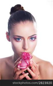 Sensual stylish young woman with pink flower - beautiful rose