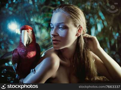 Sensual woman with a colorful ara parrot