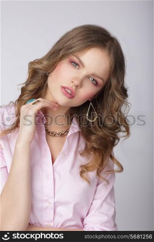 Sensuality. Stylish Lady in Pink Blouse with Ornamentation