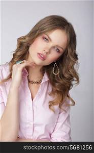 Sensuality. Stylish Lady in Pink Blouse with Ornamentation