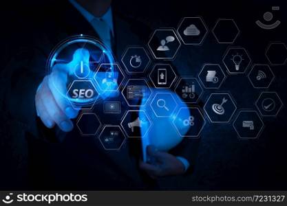 Seo Optimization for website with mobile website and Landing page virtual diagram.engineer pushing start button on touch screen computer interface