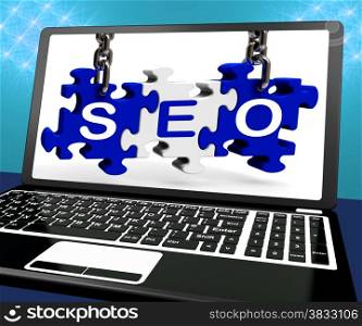 . SEO Puzzle On Laptop Shows Online Searching And Website Optimizer
