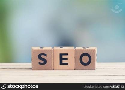 SEO sign on a table made of wooden cubes